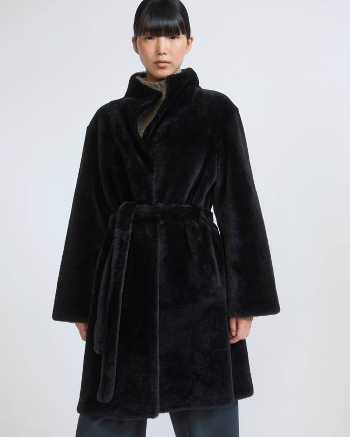 Long Beige Coat Styled Over Checked Shirt and Wide-Leg Trousers — Shearling Coat Outfits