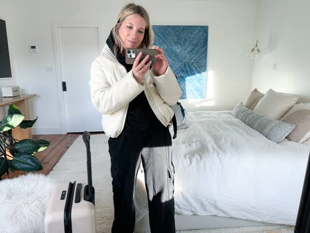 Cream Puffer Jacket Over Hoodie with Cargo Pants for a Relaxed Airport Look Cream Puffer Jacket Over Hoodie with Cargo Pants for a Relaxed Airport Look β Winter Airport Outfits