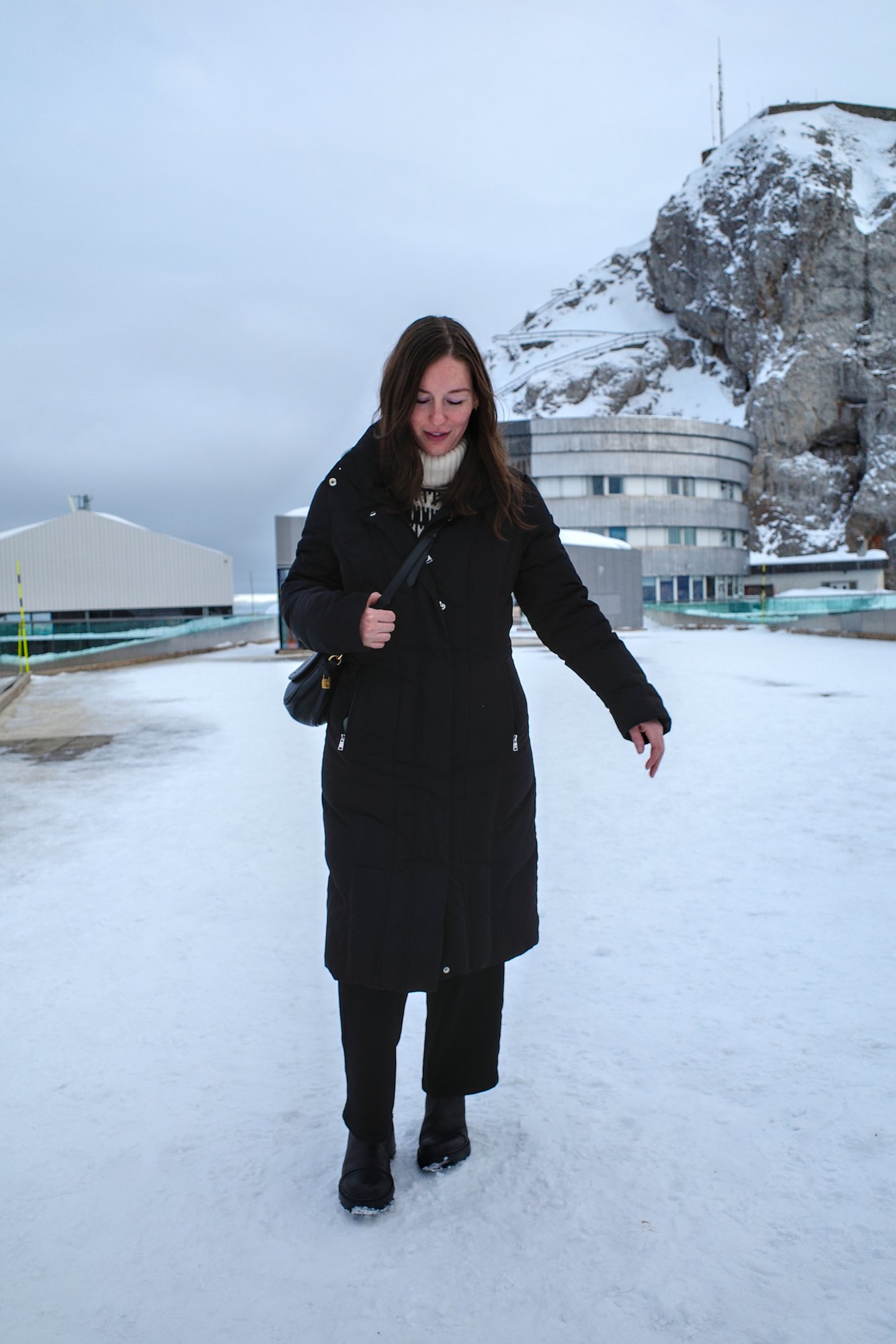 Longline Puffer Coat for Ultimate Warmth in Winter Travel — Winter Travel Outfits
