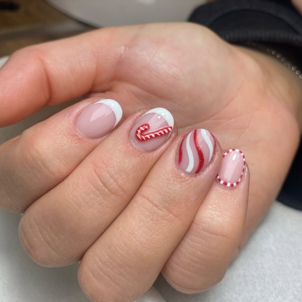 Nude Candy Cane Stripe French Almonds Nude Candy Cane Stripe French Almonds β Simple Christmas Nails 2026