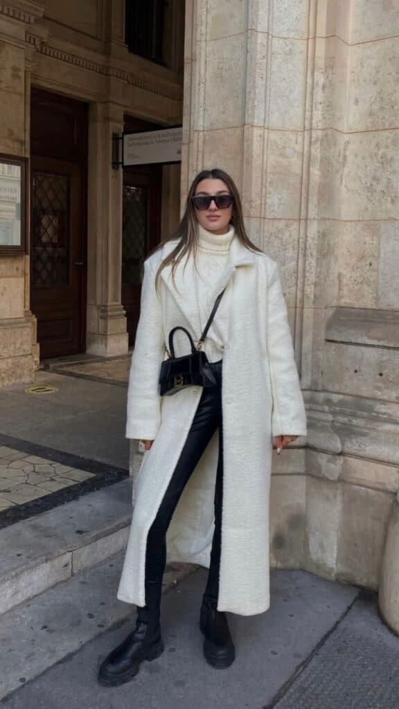 Long Cream Wool Coat Over White Turtleneck and Leather Pants — Italy Winter Outfits