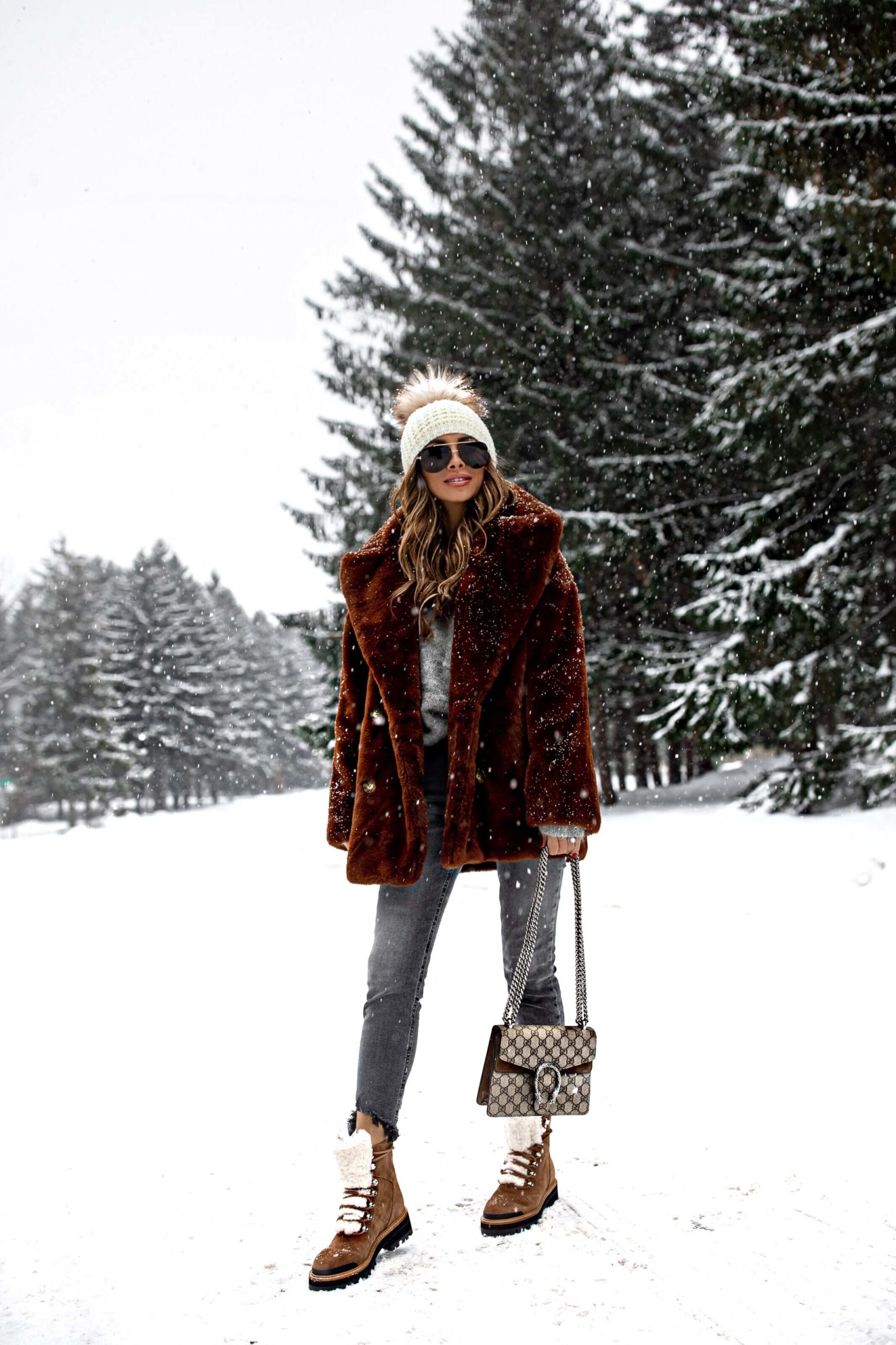 Fluffy Earmuffs with Brown Faux Fur Coat and Grey Jeans Fluffy Earmuffs with Brown Faux Fur Coat and Grey Jeans β Earmuffs Outfits