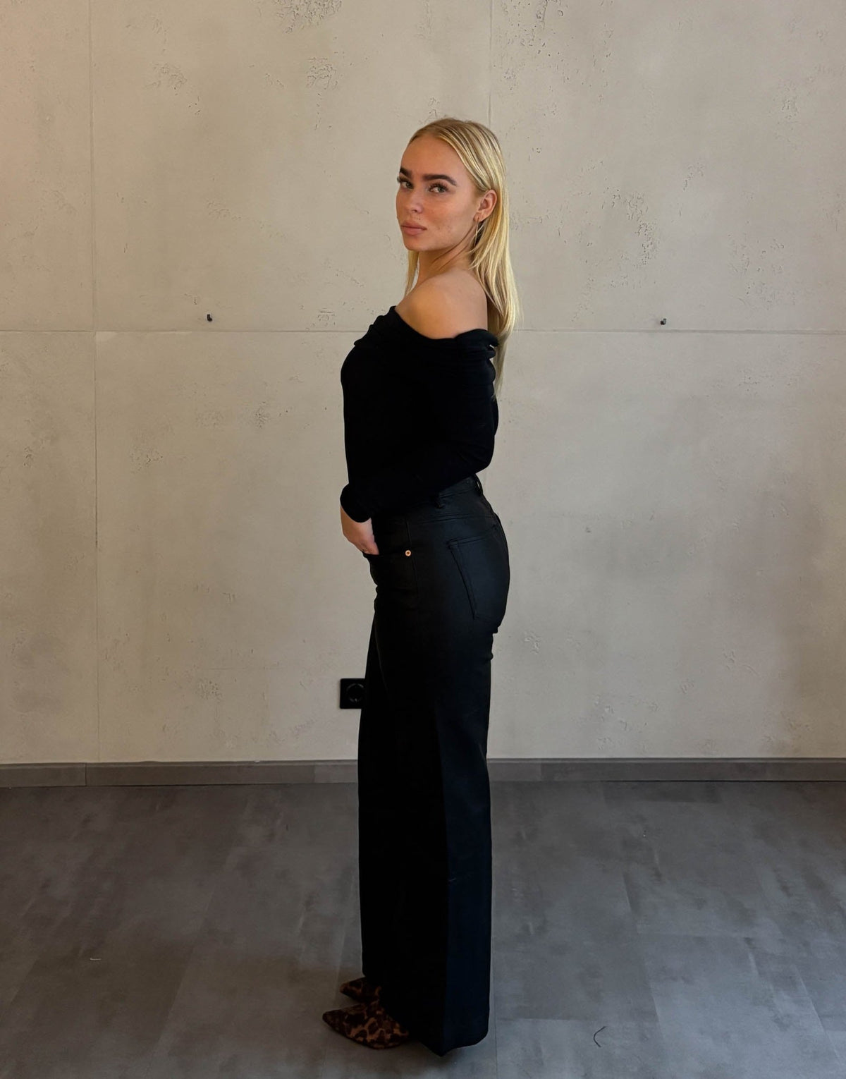 Black Wide-Leg Leather Pants with Off-the-Shoulder Top and Heels — Leather Pants Outfits