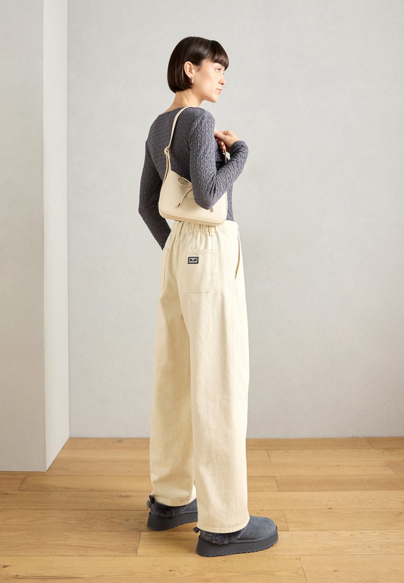 Wide-Leg Pants and Uggs for Casual Comfort — Ugg Boots Outfits