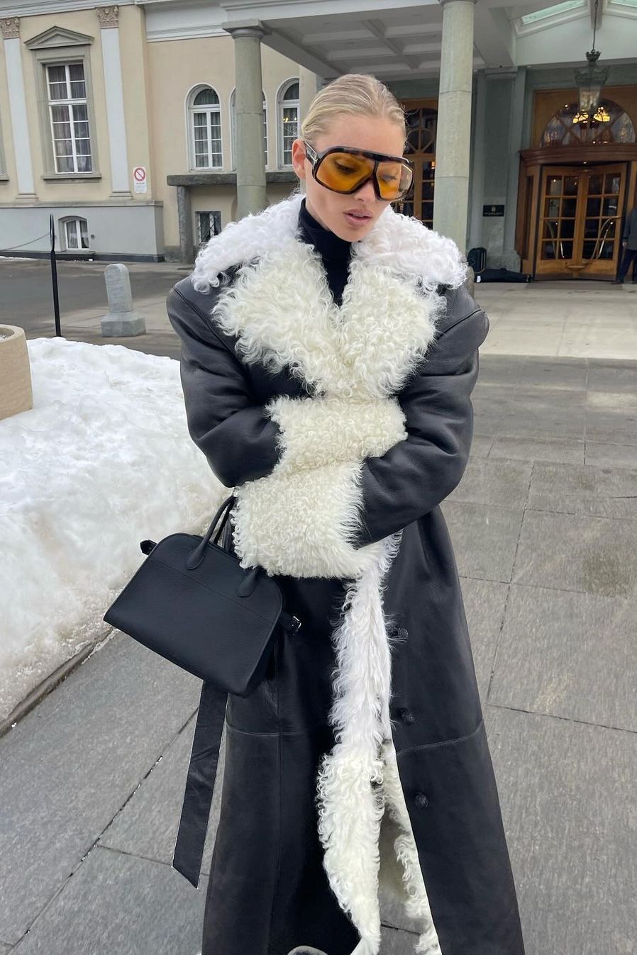 Long Black Shearling Coat with White Lining and Turtleneck — Shearling Coat Outfits