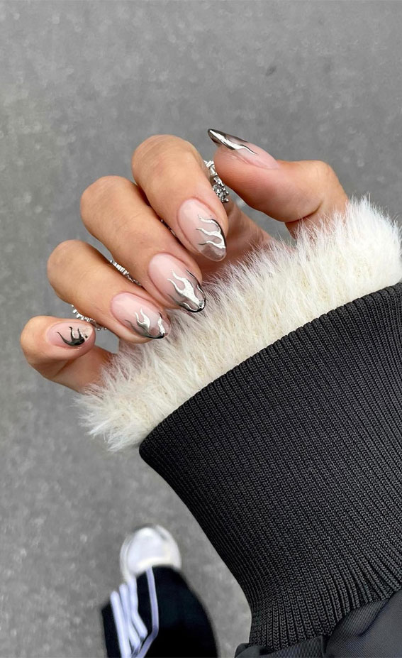 Silver Chrome Flames on Clear Almond Tips Silver Chrome Flames on Clear Almond Tips β Silver Chrome Nails