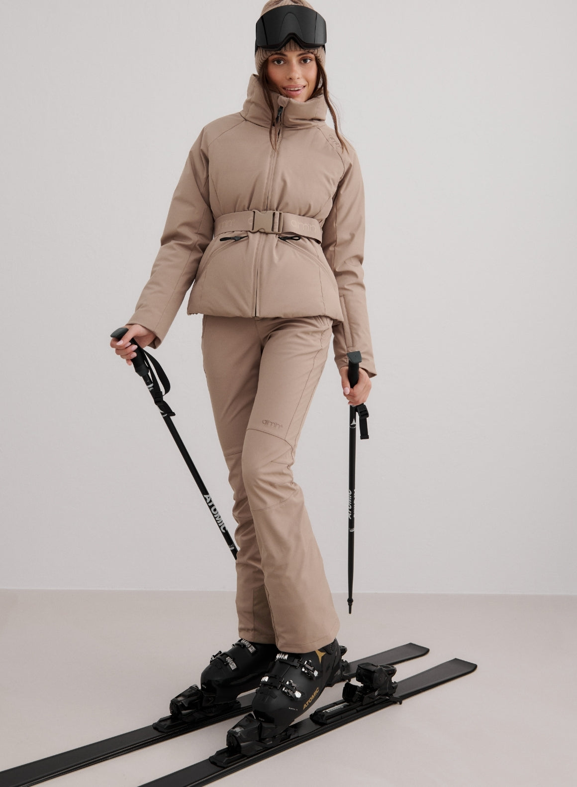 Monochromatic Beige Ski Suit with Belted Jacket Monochromatic Beige Ski Suit with Belted Jacket — Ski Outfits