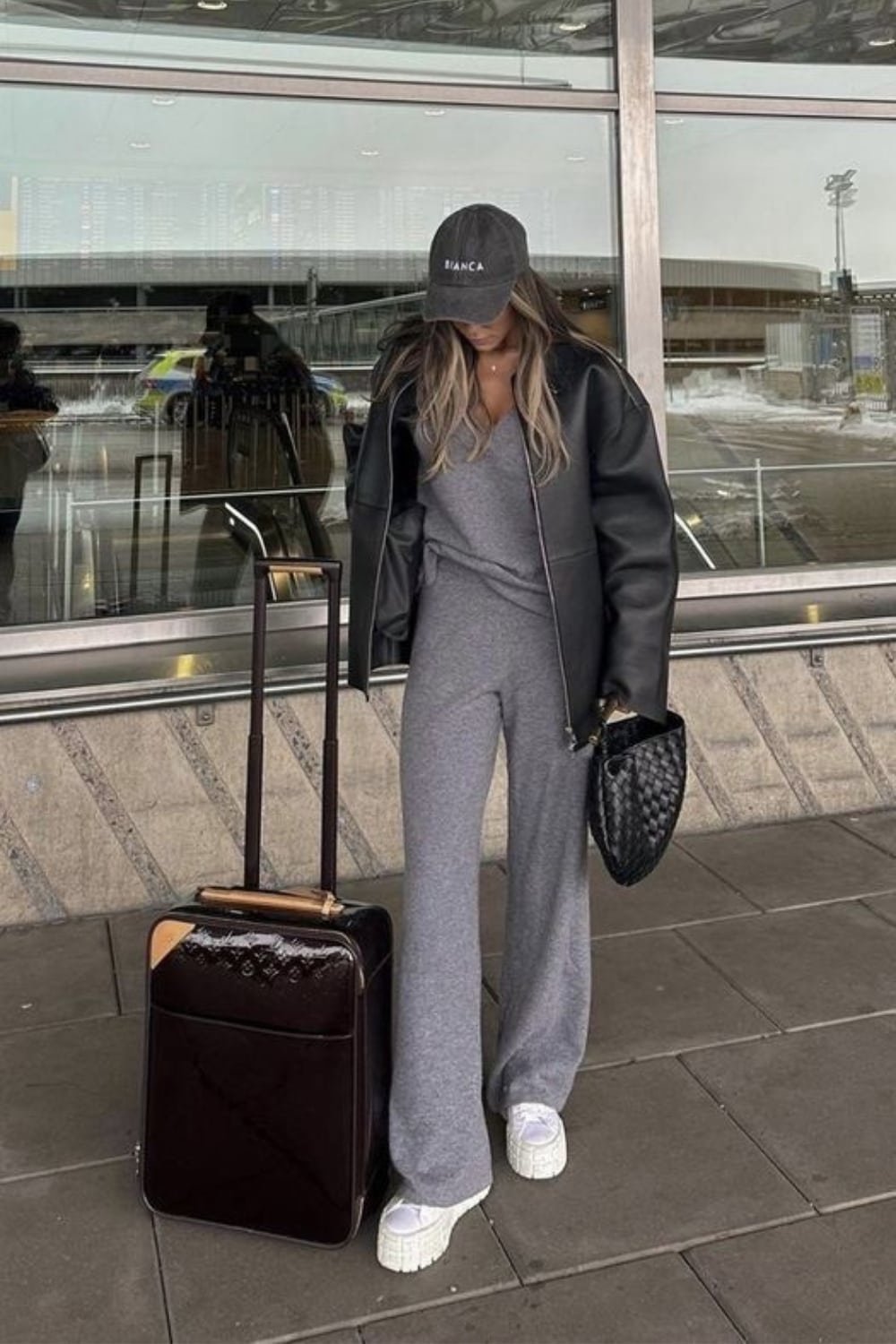 Faux Leather Jacket with Knit Jumpsuit and Platform Sneakers for a Modern Airport Style Faux Leather Jacket with Knit Jumpsuit and Platform Sneakers for a Modern Airport Style β Winter Airport Outfits