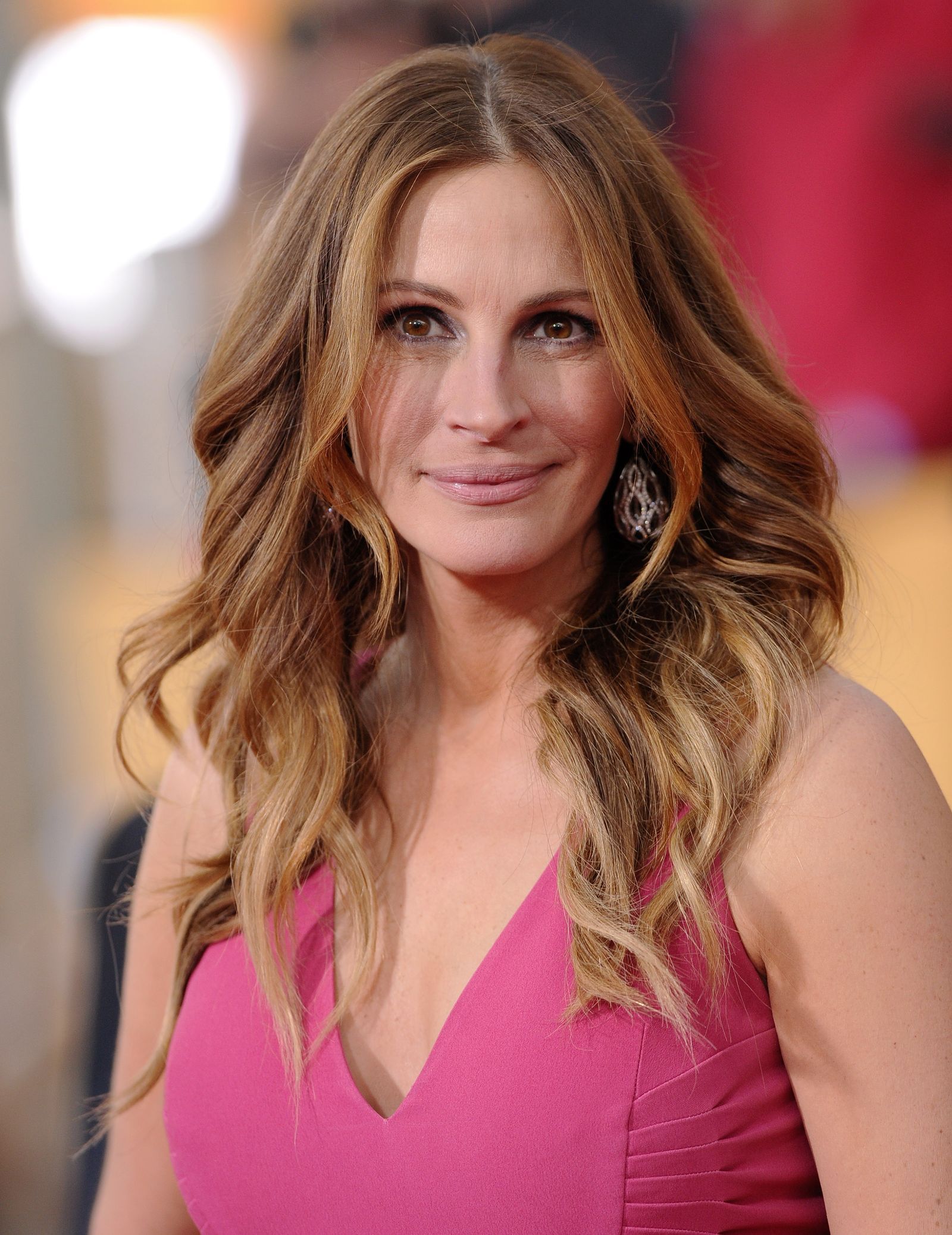 Honey Blonde Flowing Waves Honey Blonde Flowing Waves β Winter Hairstyles for Women Over 50