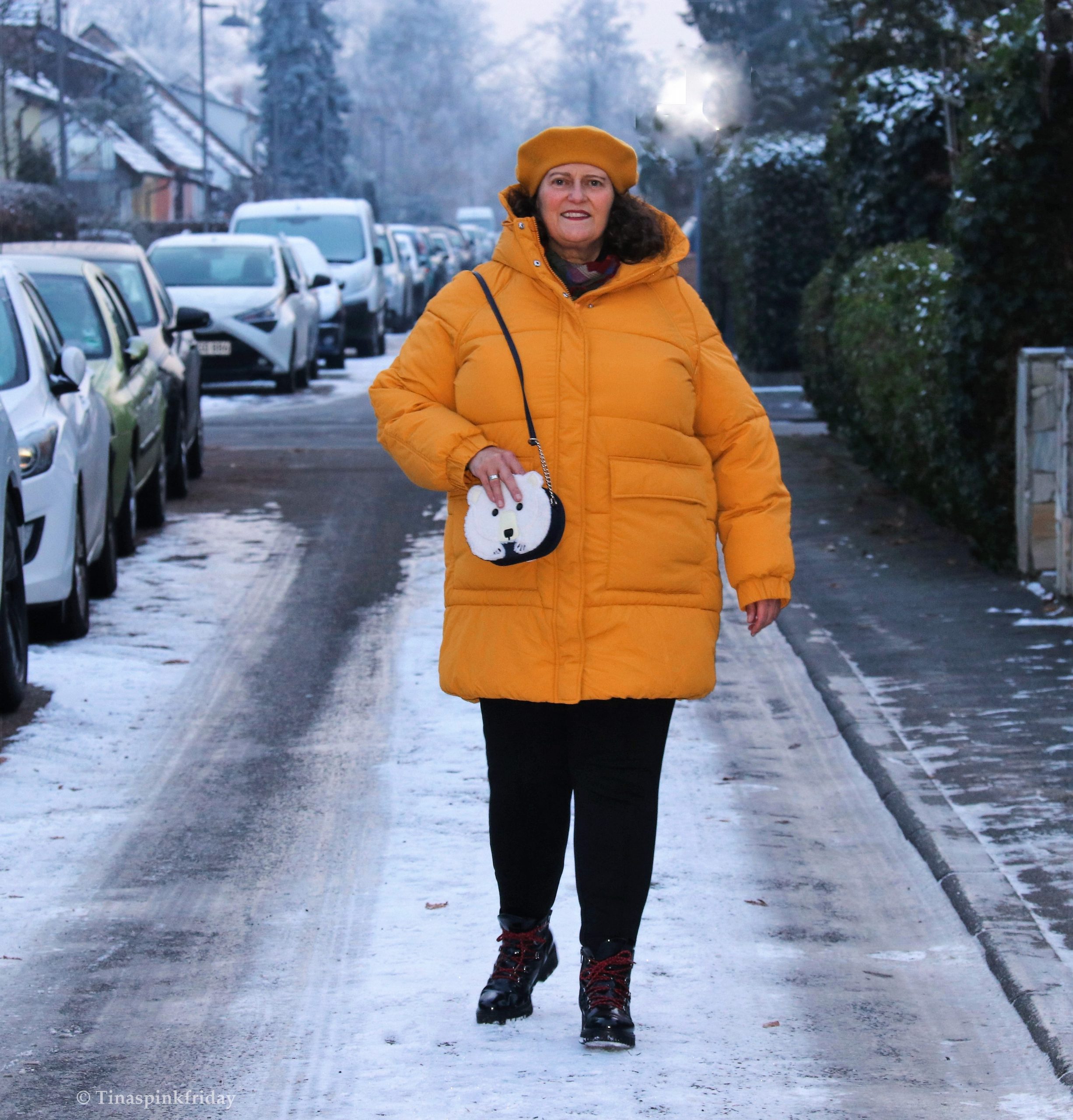 Playful Winter Look: Yellow Puffer Coat with Bear Motif Bag — Late Winter Outfits