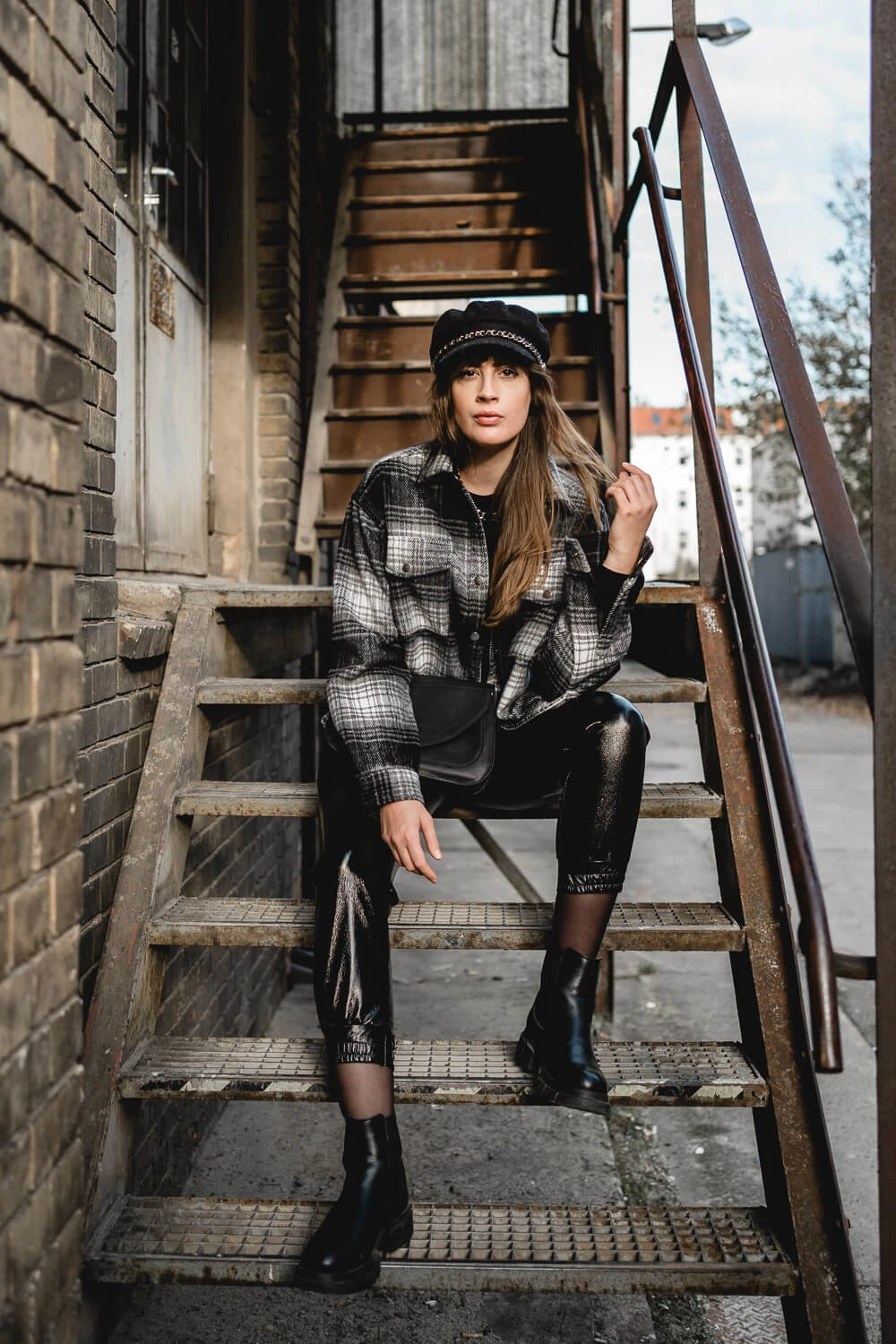 Black Leather Pants with Plaid Shirt, Cap, and Ankle Boots — Leather Pants Outfits