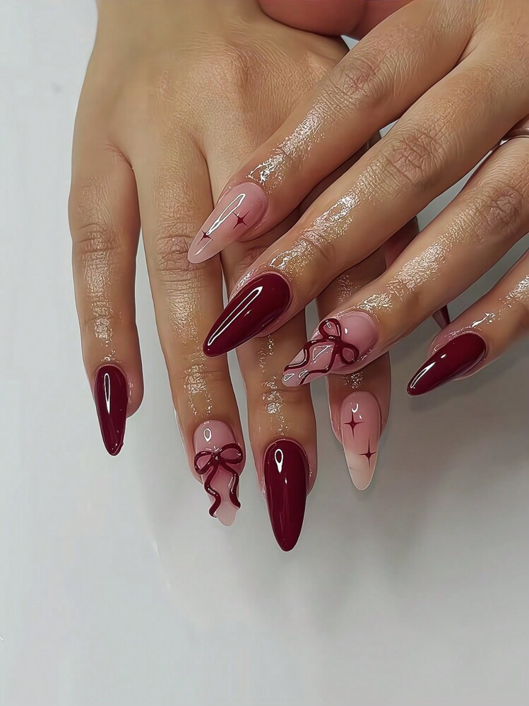 Bows And Stars On Accent Nails Visual Idea Bows And Stars On Accent Nails Visual Idea β Wine Christmas Nails 2026