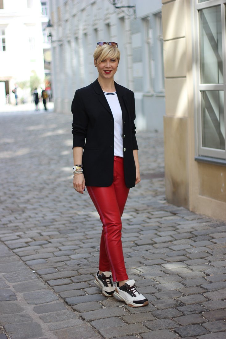 Fitted Red Leather Pants with White Tee, Black Blazer, and Chunky Sneakers — Leather Pants Outfits