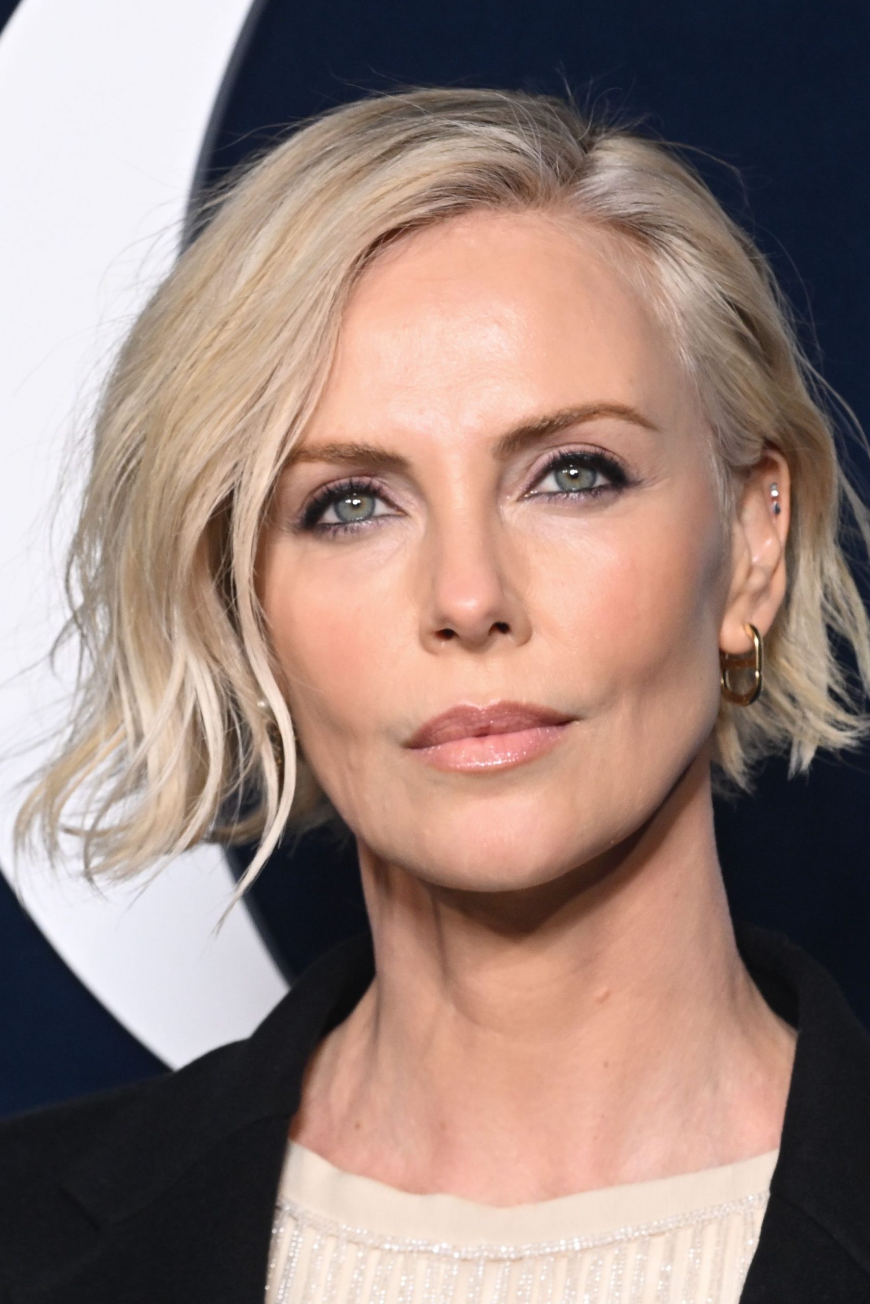 Ash Blonde Bob With Textured Waves And Fringe — Winter Haircuts for Women Over 60