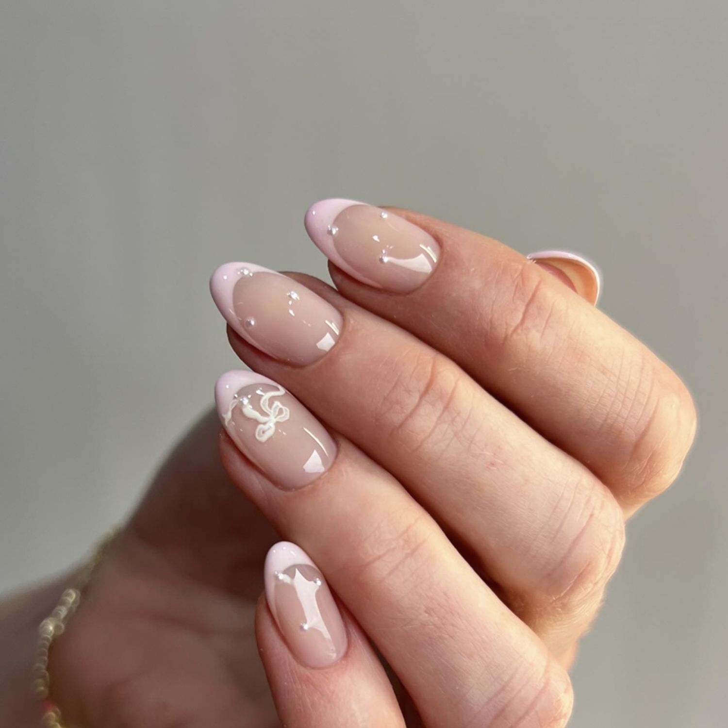 Sheer Nude White Bow Dot French Tips Sheer Nude White Bow Dot French Tips β Winter Bow Nails