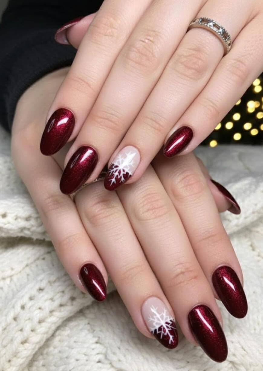 Shimmering Burgundy with White Snowflake Almonds Shimmering Burgundy with White Snowflake Almonds β Christmas Nails for Women Over 50 2026