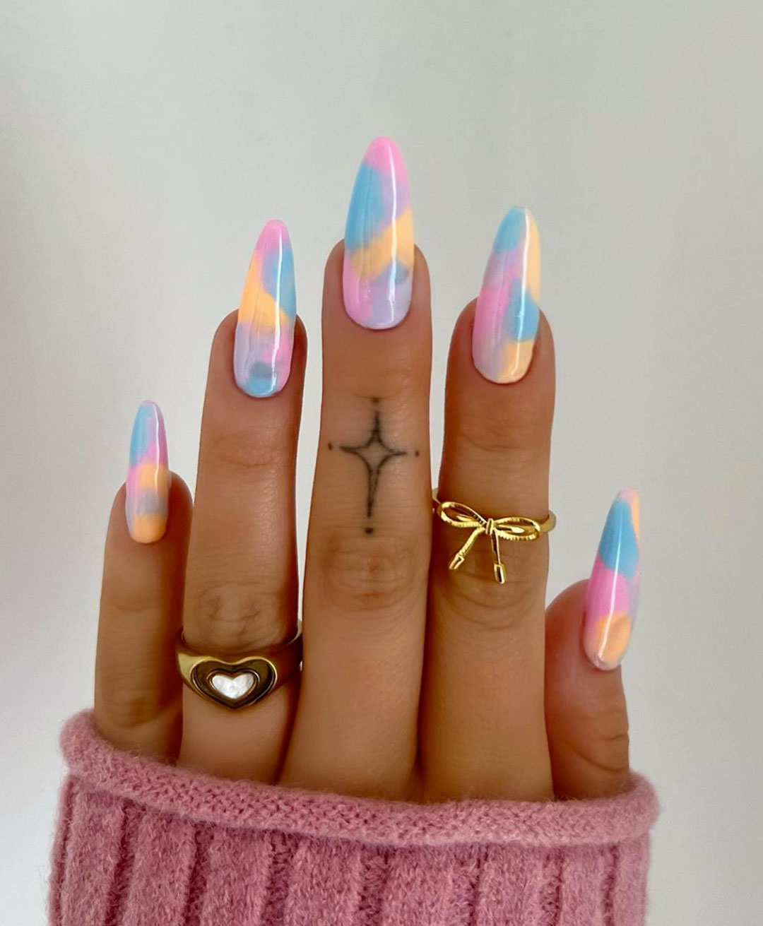 Pastel Tie-Dye Almond Nails — Holiday Nail Colors 2026