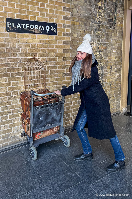 Fitted Black Coat and Pom-Pom Beanie: Casual Winter Warmth — London Winter Outfits