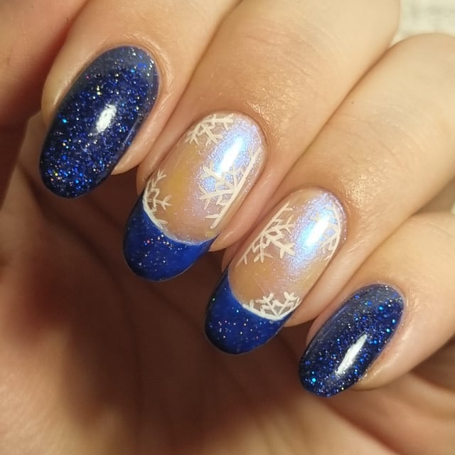Short Oval Dark Blue Glitter Snowflakes — Winter Nail Designs