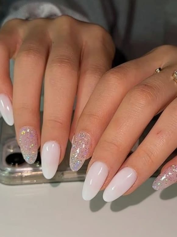 Milky White with Subtle Glitter Accents Milky White with Subtle Glitter Accents β Sparkly New Years Nails 2027