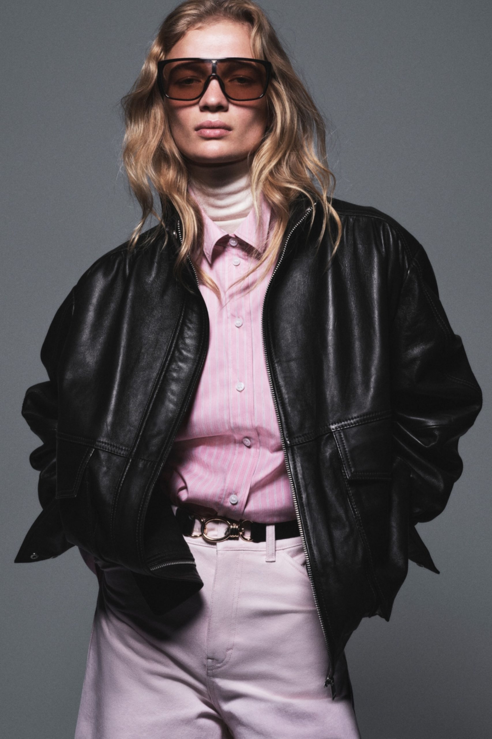 Leather Bomber Jacket Over Turtleneck and Striped Shirt Leather Bomber Jacket Over Turtleneck and Striped Shirt β Winter to Spring Transition Outfits