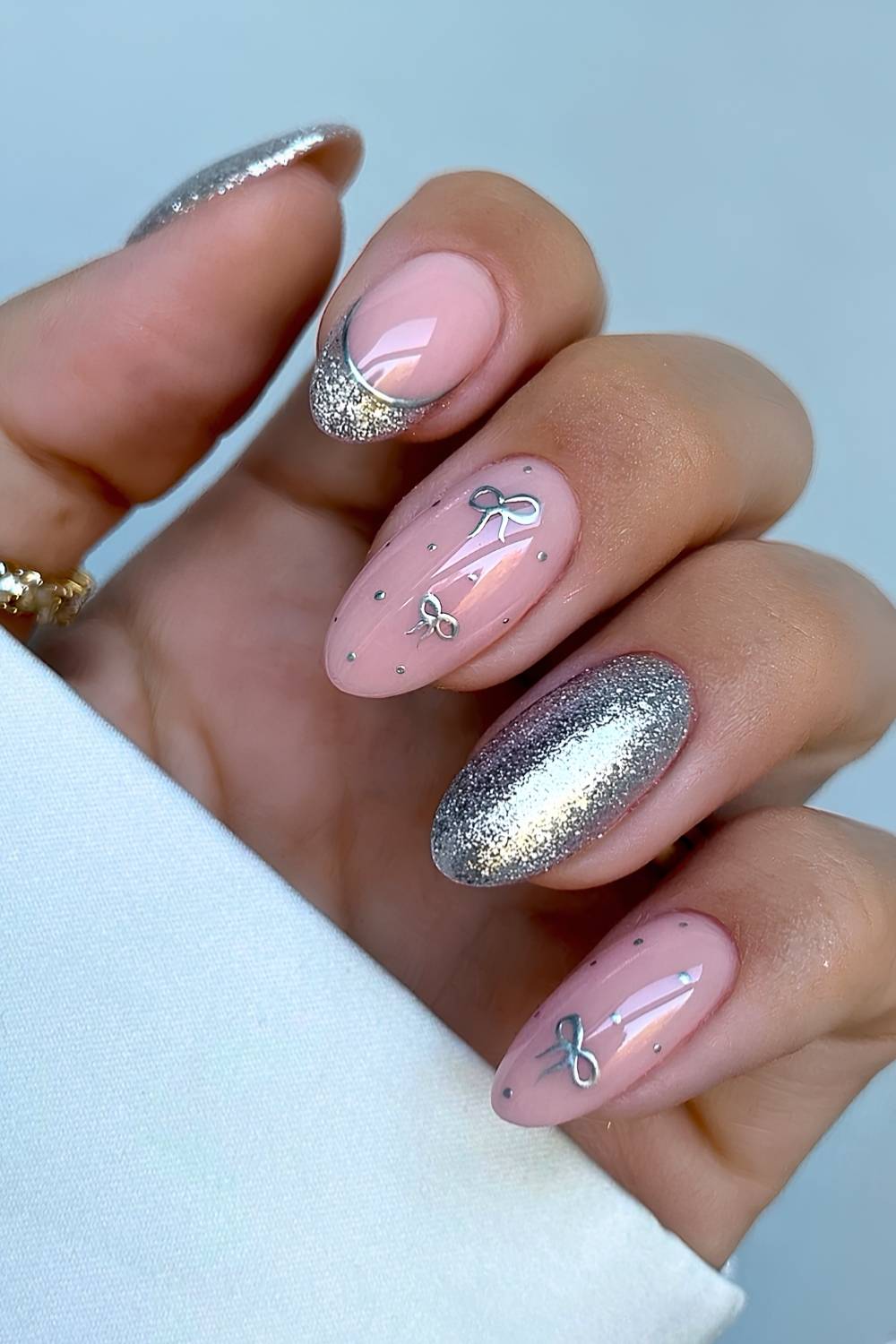 Soft Pink Nails with Silver Bow Sparkle Soft Pink Nails with Silver Bow Sparkle β Christmas Nail Art 2026