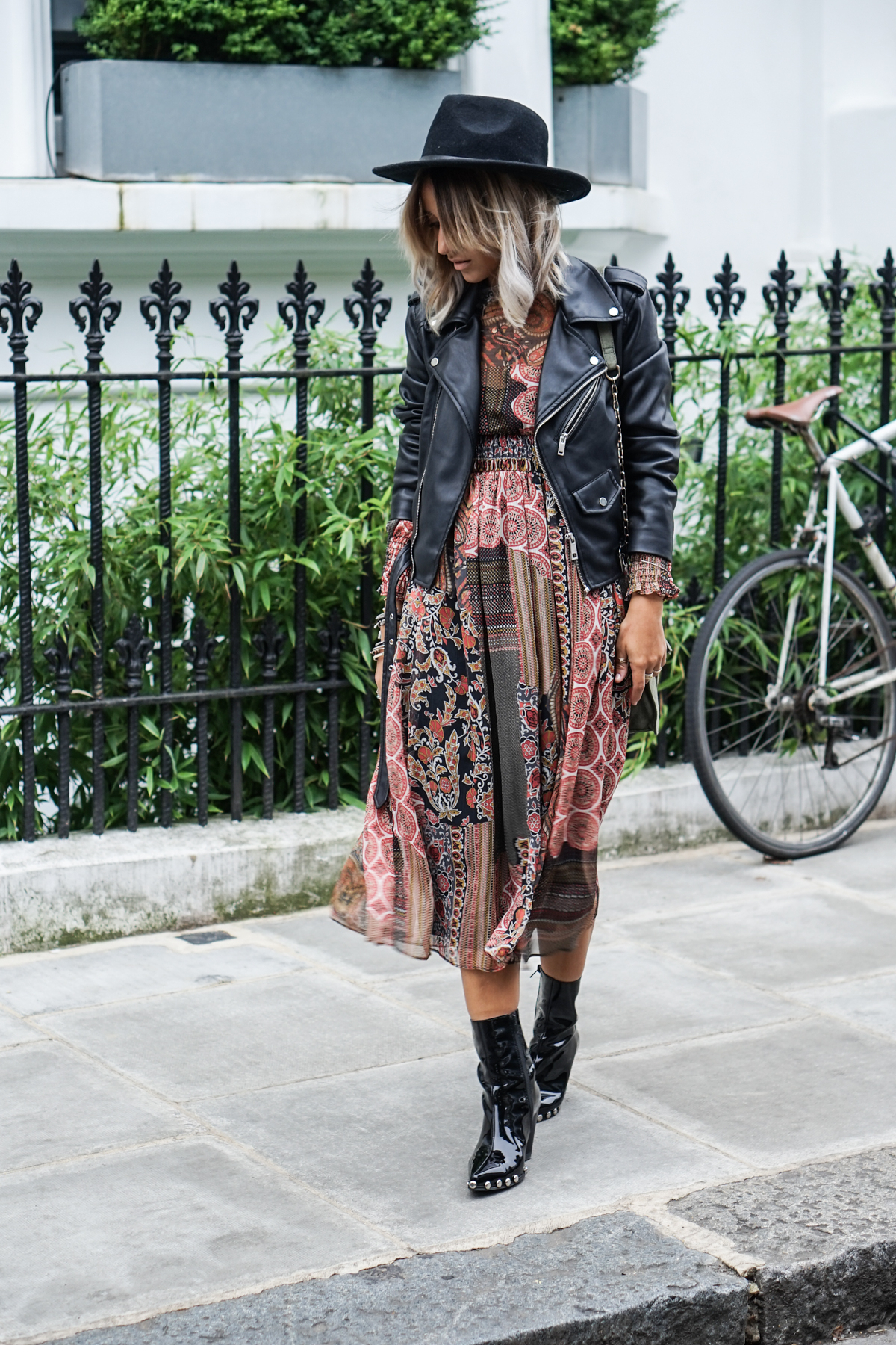 Printed Midi Dress Paired with a Leather Moto Jacket — Boho Winter Outfits