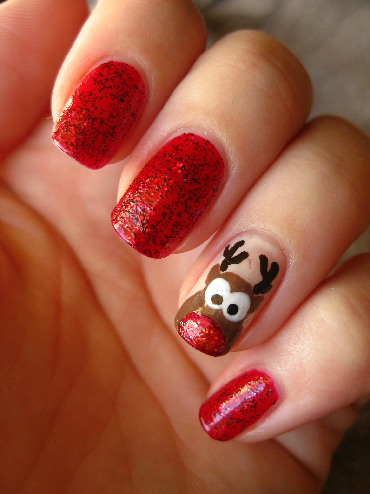 Glittery Red Glossy Accent Visual Idea Glittery Red Glossy Accent Visual Idea β Christmas Nail Art 2026