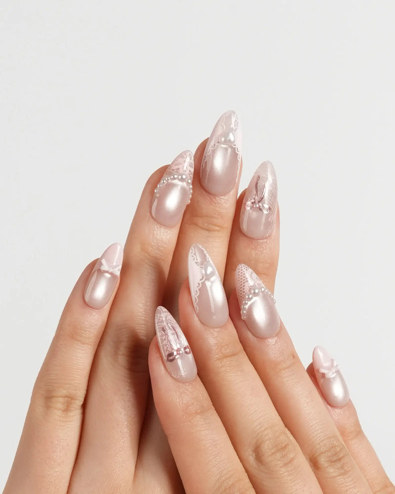 Pale Pink Pearlized Almond with 3D Bows Pale Pink Pearlized Almond with 3D Bows β Coquette Winter Nails