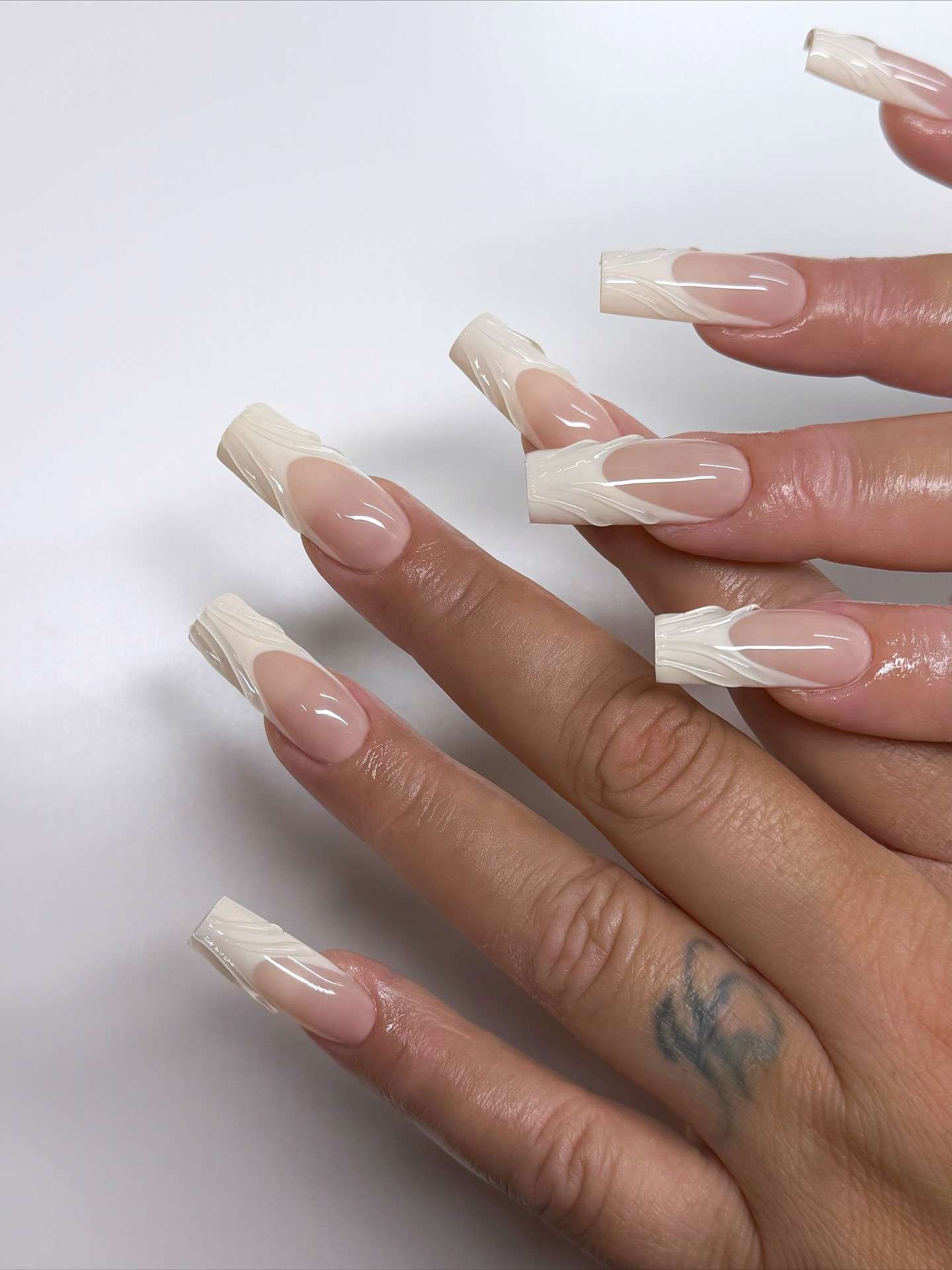 Visual Idea β Opaque White French Tip Featuring A Wavy Visual Idea β Opaque White French Tip Featuring A Wavy β Long Winter Coffin Nails