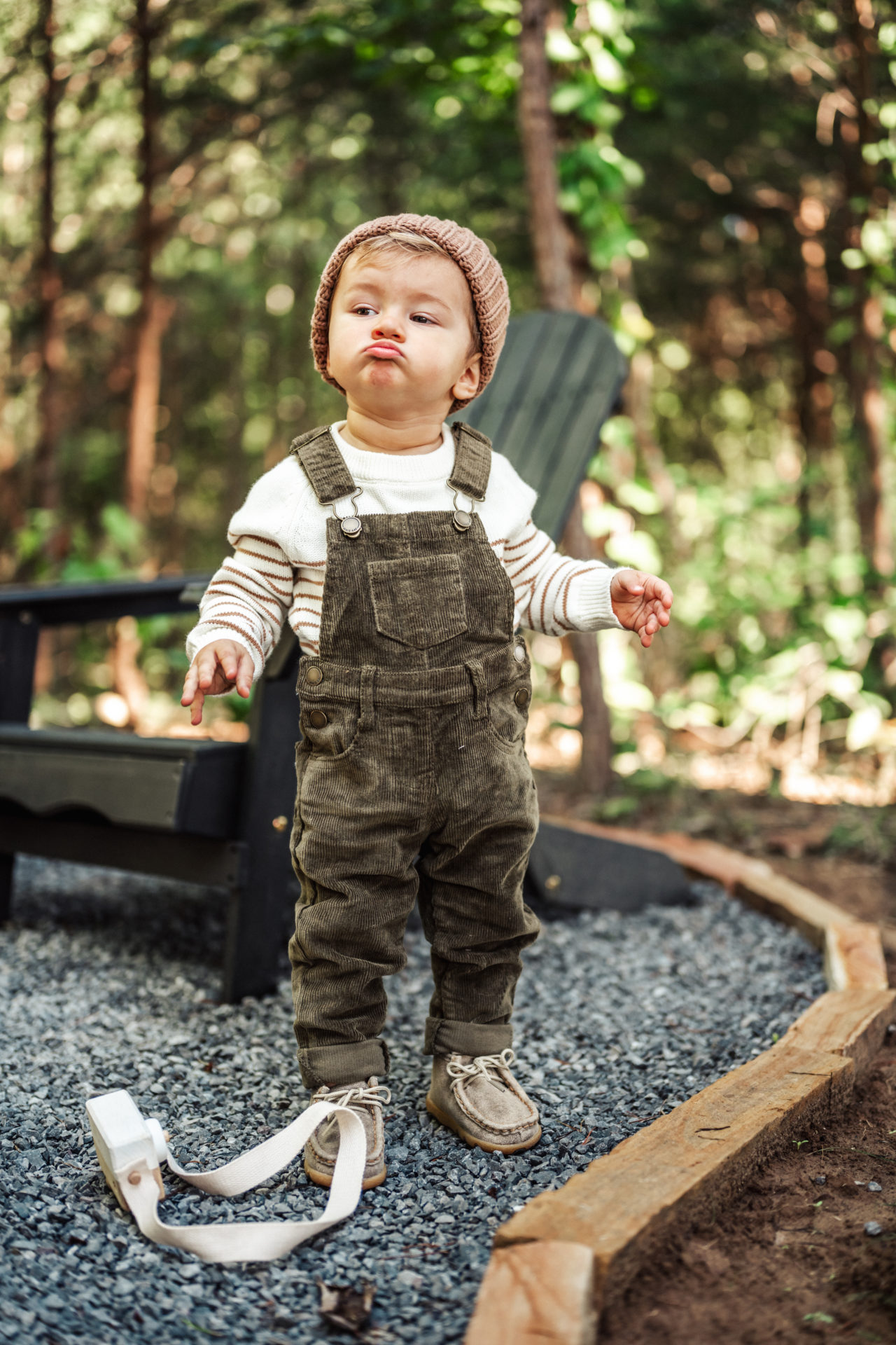Olive Corduroy Overalls Over Stripes for Playful Styling Olive Corduroy Overalls Over Stripes for Playful Styling β Winter Outfits for Kids