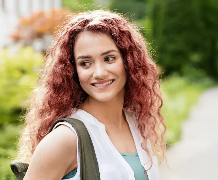 Rose Gold Curls With Subtle Highlights — Low Maintenance Winter Hair Colors