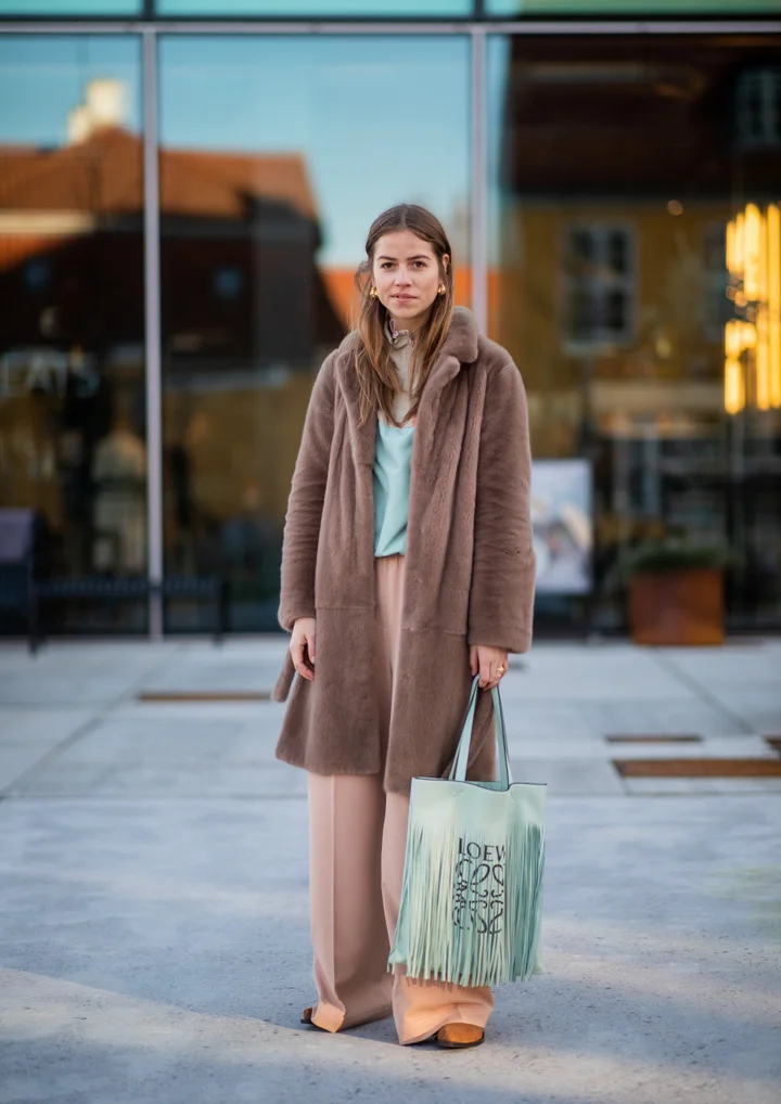 Faux Fur Coat and Light Blue Knit with Wide-Leg Pants Faux Fur Coat and Light Blue Knit with Wide-Leg Pants β Scandinavian Winter Outfits