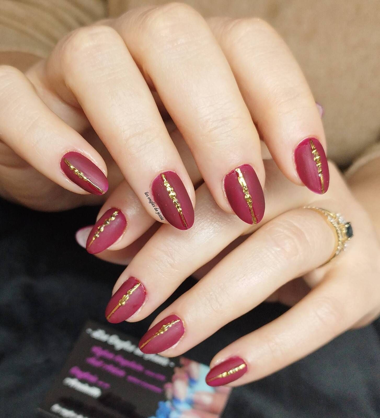 Matte Burgundy with Gold Foil Lines Matte Burgundy with Gold Foil Lines β Burgundy Christmas Nails 2026