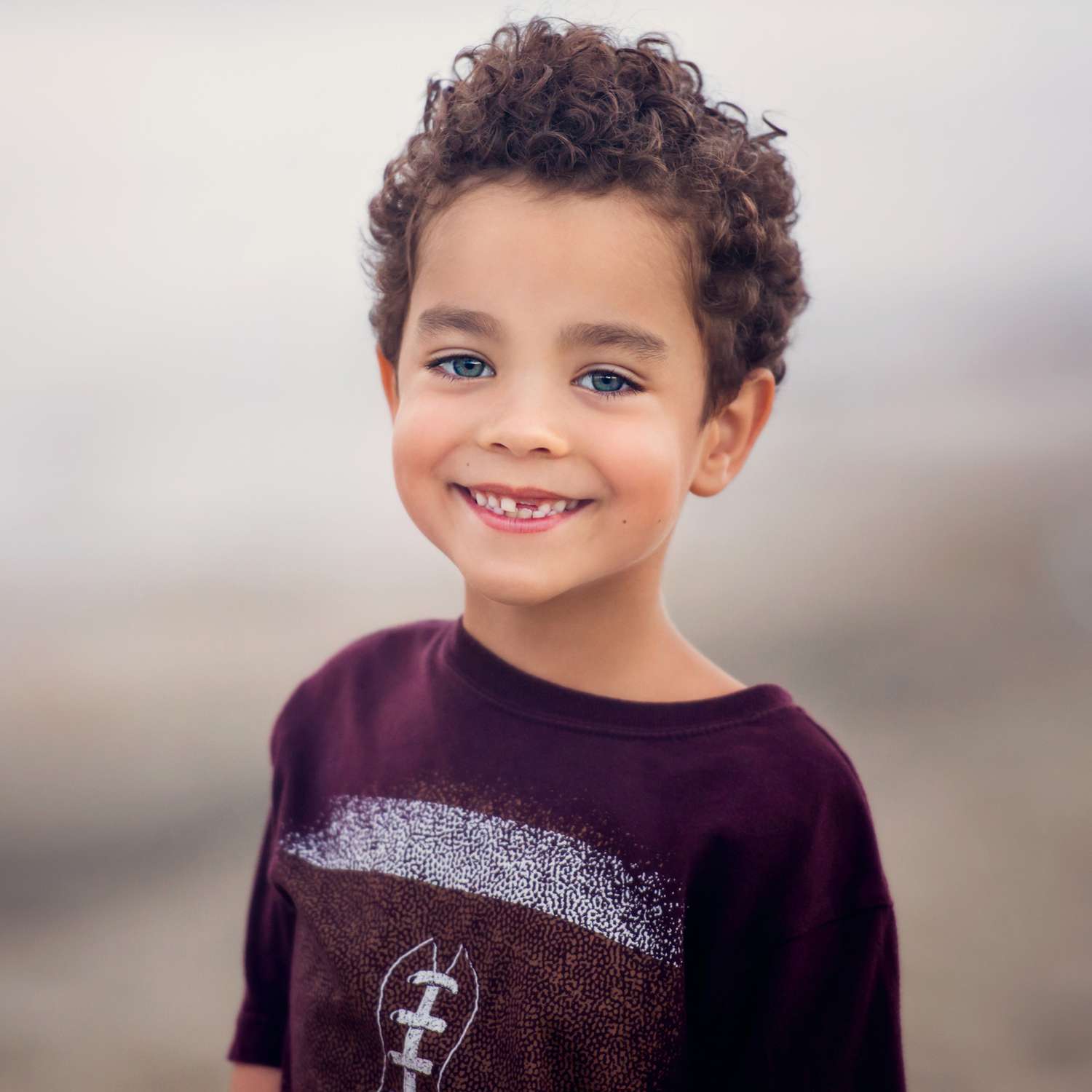 Chin Length Curly Cut With Middle Part — Winter Haircuts for Boys