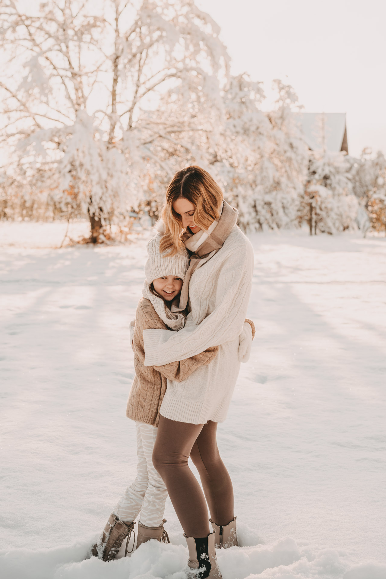 Cozy Knitwear Duo: Cream Cable-Knit Sweater and Grey Sweater for Mother and Daughter Cozy Knitwear Duo: Cream Cable-Knit Sweater and Grey Sweater for Mother and Daughter β Winter Family Photo Outfits