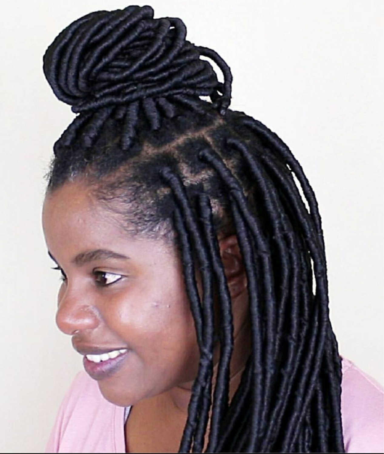 Black Locs Styled Into High Crown Bun Black Locs Styled Into High Crown Bun β Winter Hairstyles for Black Kids