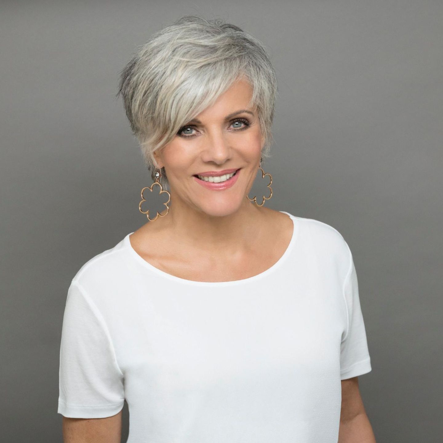Vibrant Silver Pixie With Asymmetrical Bangs Vibrant Silver Pixie With Asymmetrical Bangs β Winter Haircuts for Gray Hair