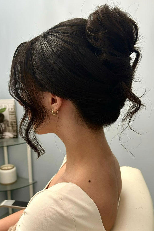 Twisted Updo With Loose Tendrils Twisted Updo With Loose Tendrils β Winter Formal Hairstyles