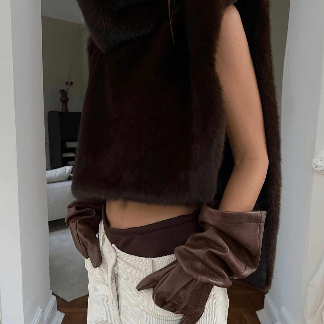 Cropped Faux Fur Vest Over Long Sleeves with Corduroy Trousers Cropped Faux Fur Vest Over Long Sleeves with Corduroy Trousers β Y2K Winter Outfits