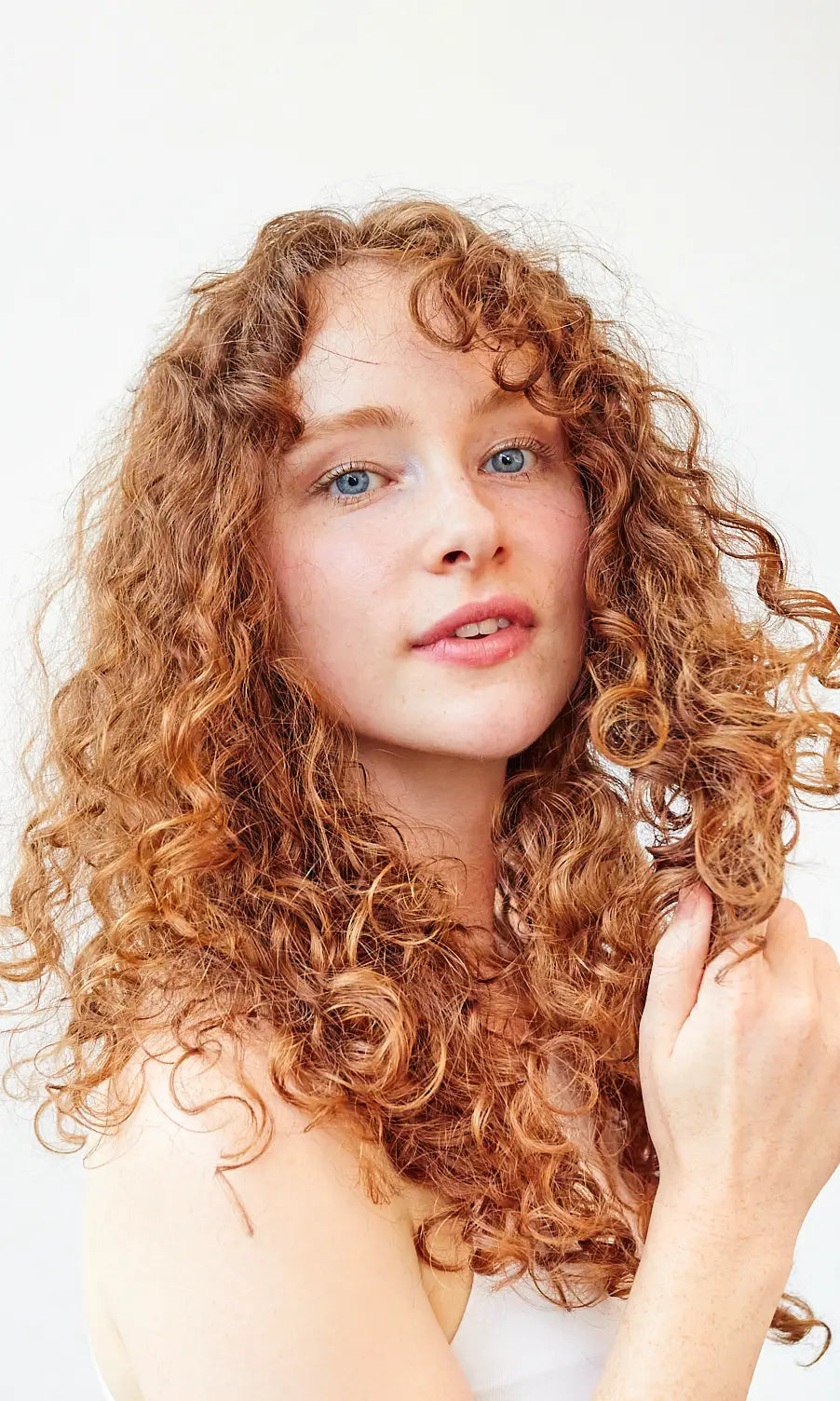 Vibrant Auburn Mid Back Curls Vibrant Auburn Mid Back Curls β Winter Hairstyles for Curly Hair