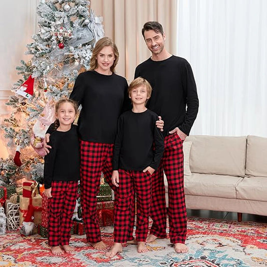 Matching Plaid Pajama Pants: Black Tops and Red Plaid for a Festive Family Photo Matching Plaid Pajama Pants: Black Tops and Red Plaid for a Festive Family Photo β Winter Family Photo Outfits