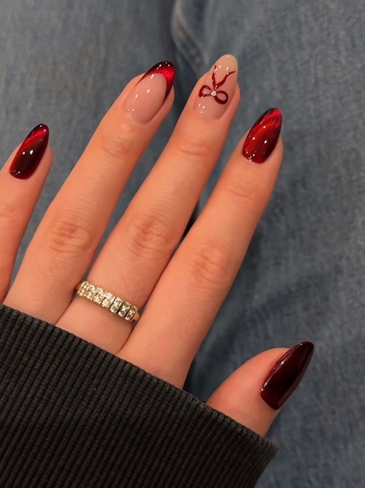 Cat Eye Red French and Bow Almond Nails Cat Eye Red French and Bow Almond Nails β Christmas Stiletto Nails 2026