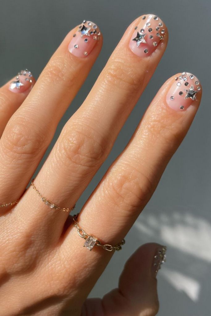 Short Nude with Silver Star Rhinestone Accents Short Nude with Silver Star Rhinestone Accents β Sparkly New Years Nails 2027