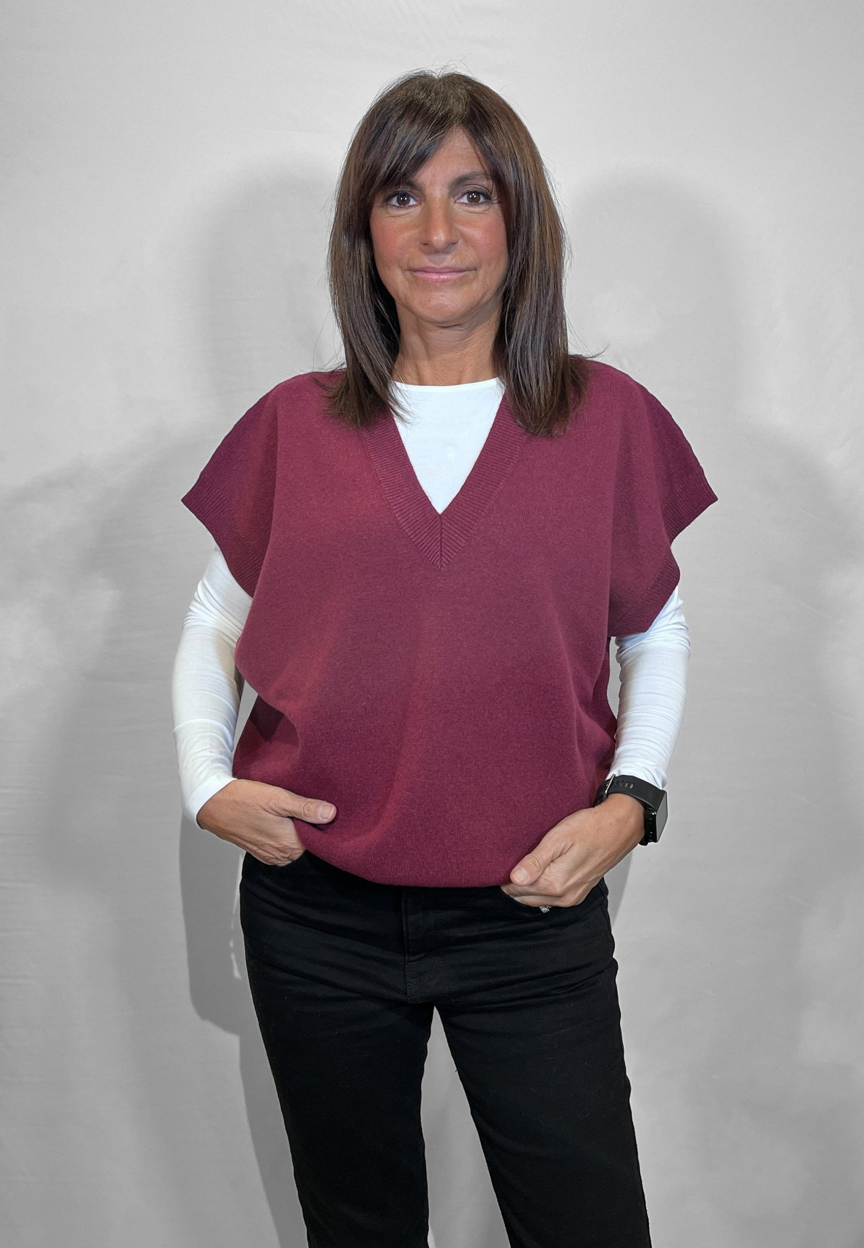 Casual Layering: Burgundy Vest Over White Top Casual Layering: Burgundy Vest Over White Top β Winter Outfits for Women Over 40