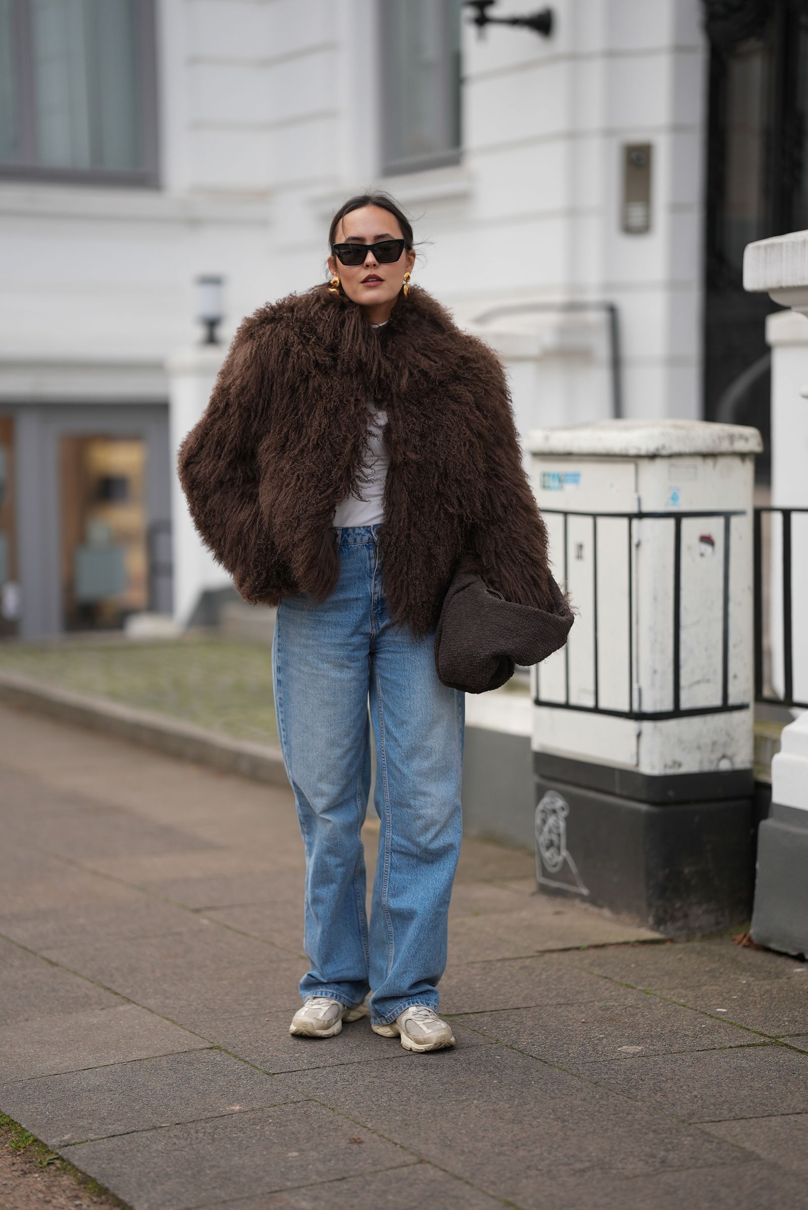 Faux Fur Jacket and Relaxed Jeans with Grey Sneakers — Winter Outfits with Sneakers