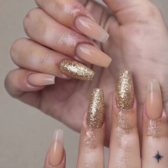 Sheer Nude Gold Glitter Visual Idea Sheer Nude Gold Glitter Visual Idea β Sparkly New Years Nails 2027