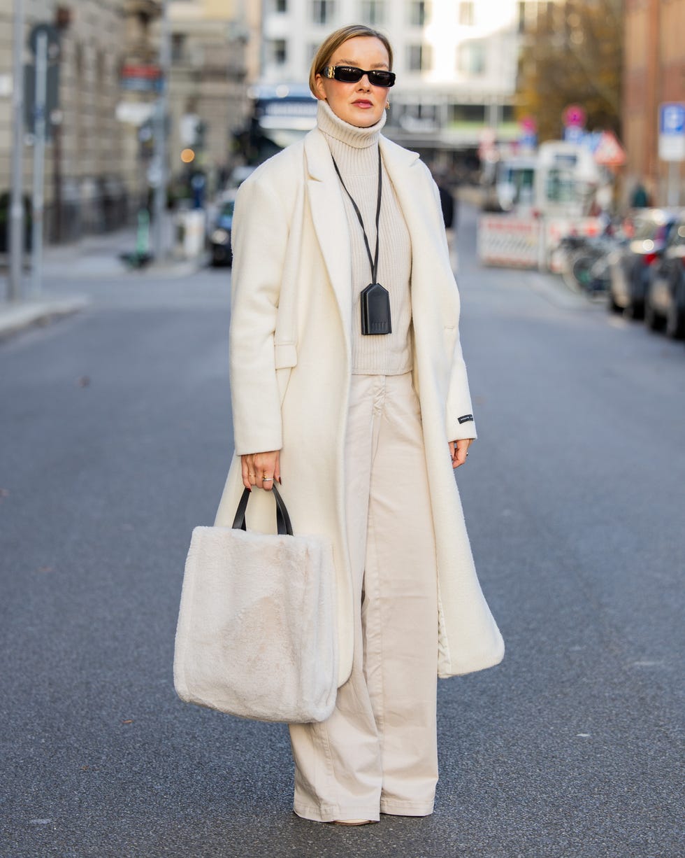 Cozy White Coat Over Beige Trousers — Winter White Outfits