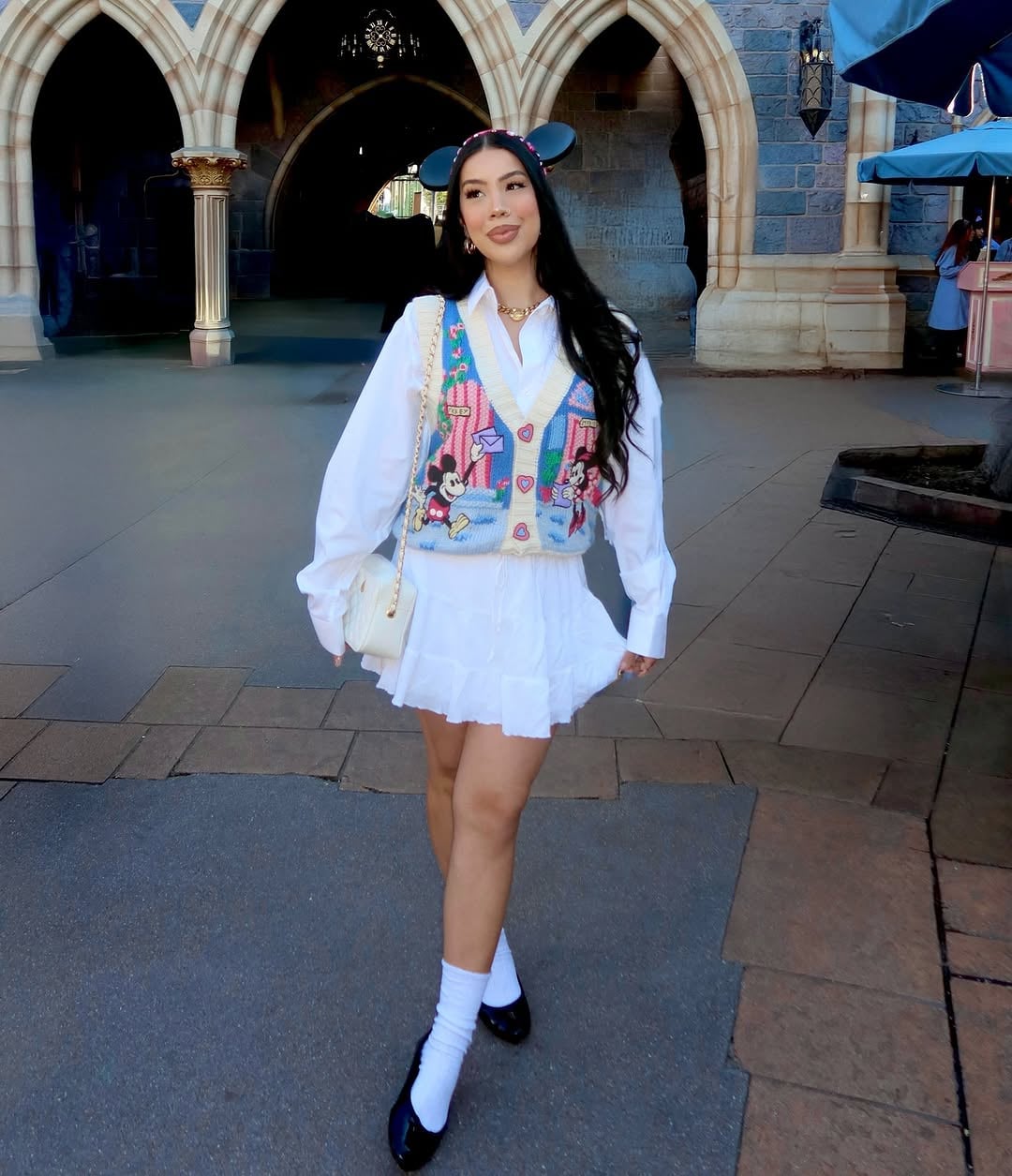 Disney Character Vest Over Button-Down for a Playful Theme Park Outfit Disney Character Vest Over Button-Down for a Playful Theme Park Outfit β Disney Winter Outfits