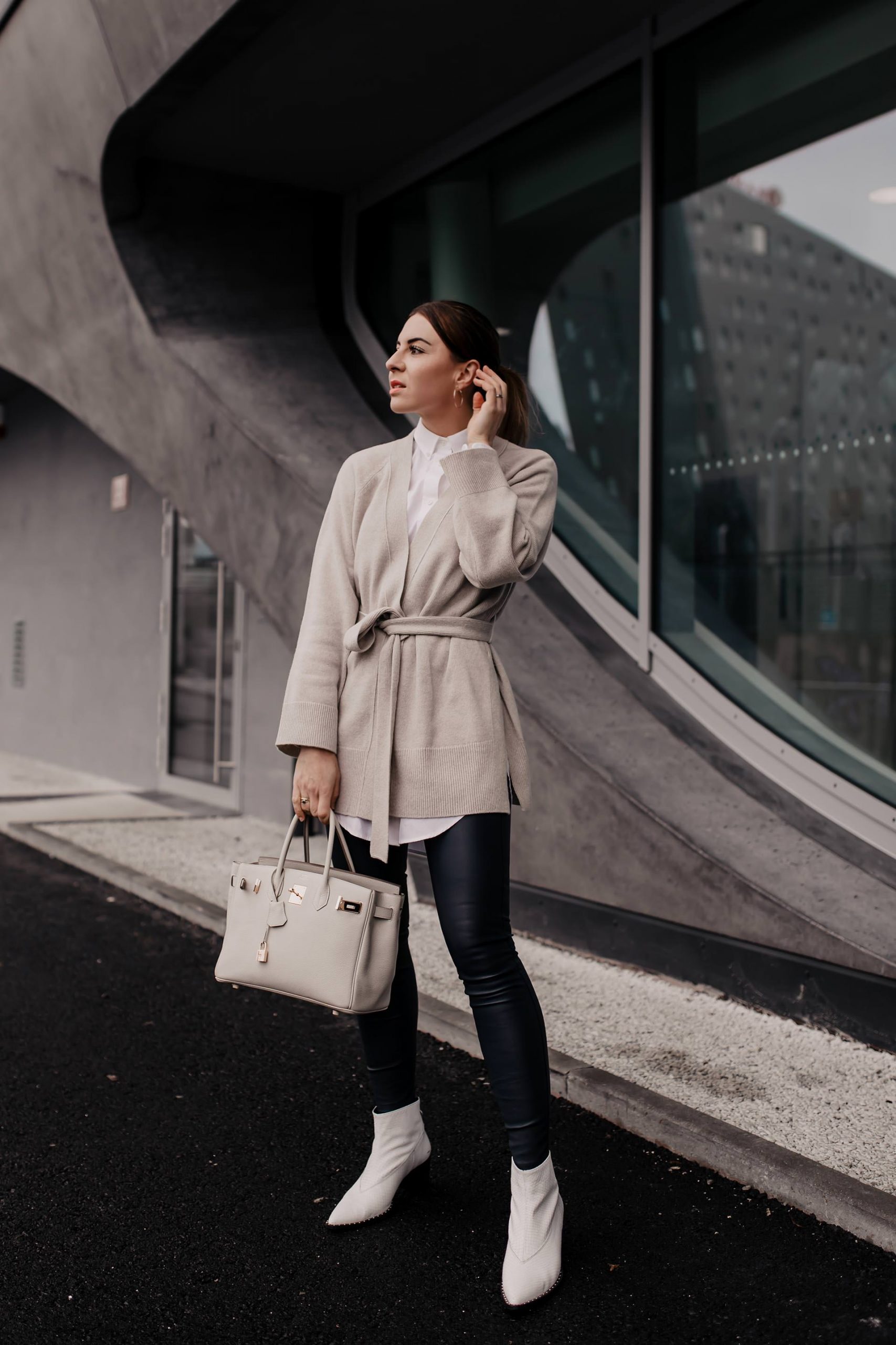 Black Skinny Leather Pants with White Shirt, Belted Cardigan, and Ankle Boots — Leather Pants Outfits
